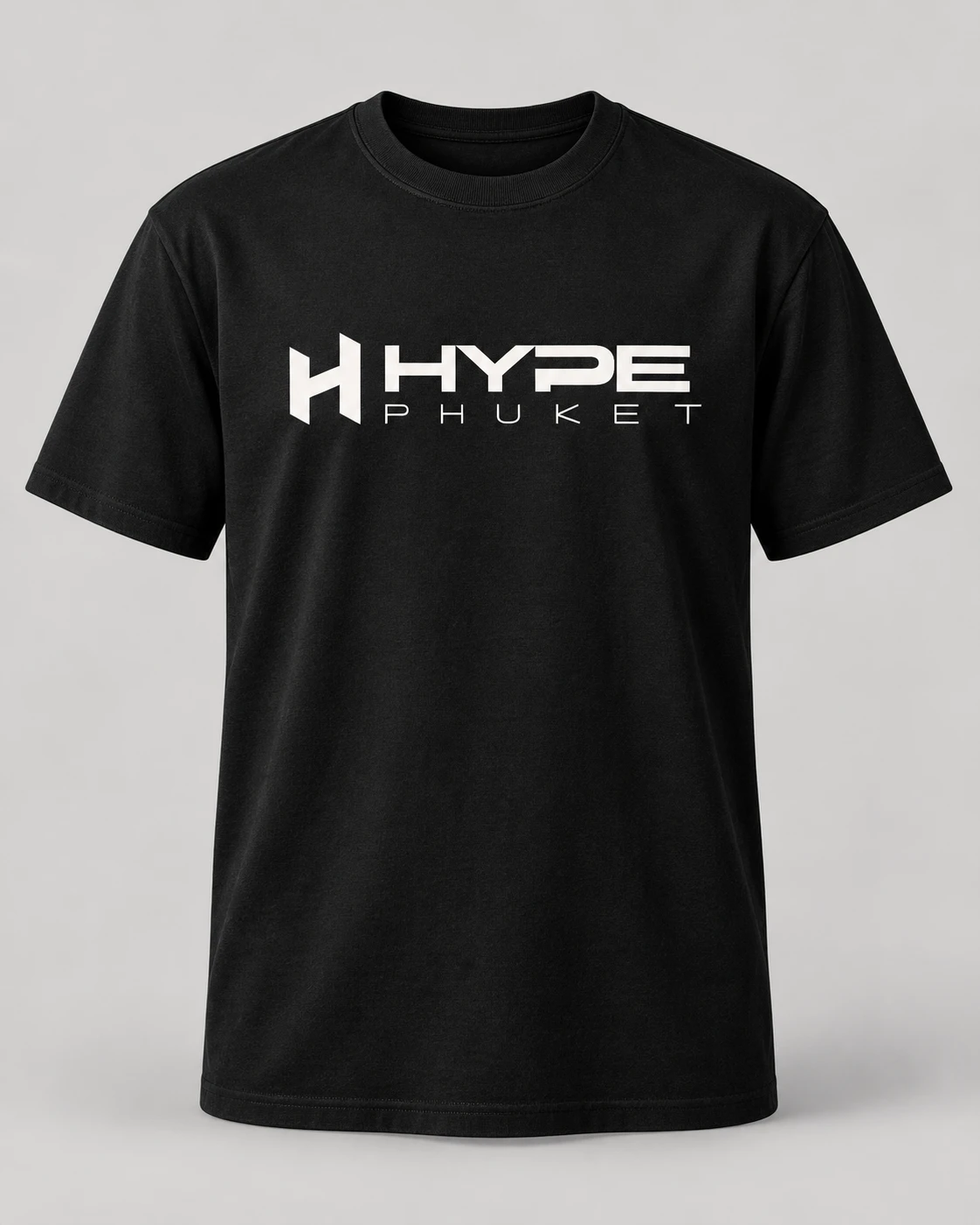 Design mockup of a black short-sleeve T-shirt with the white Hype Phuket logo centered on the chest.